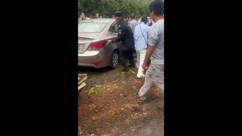 Car plows into crowd outside school in eastern China, injuring multiple people